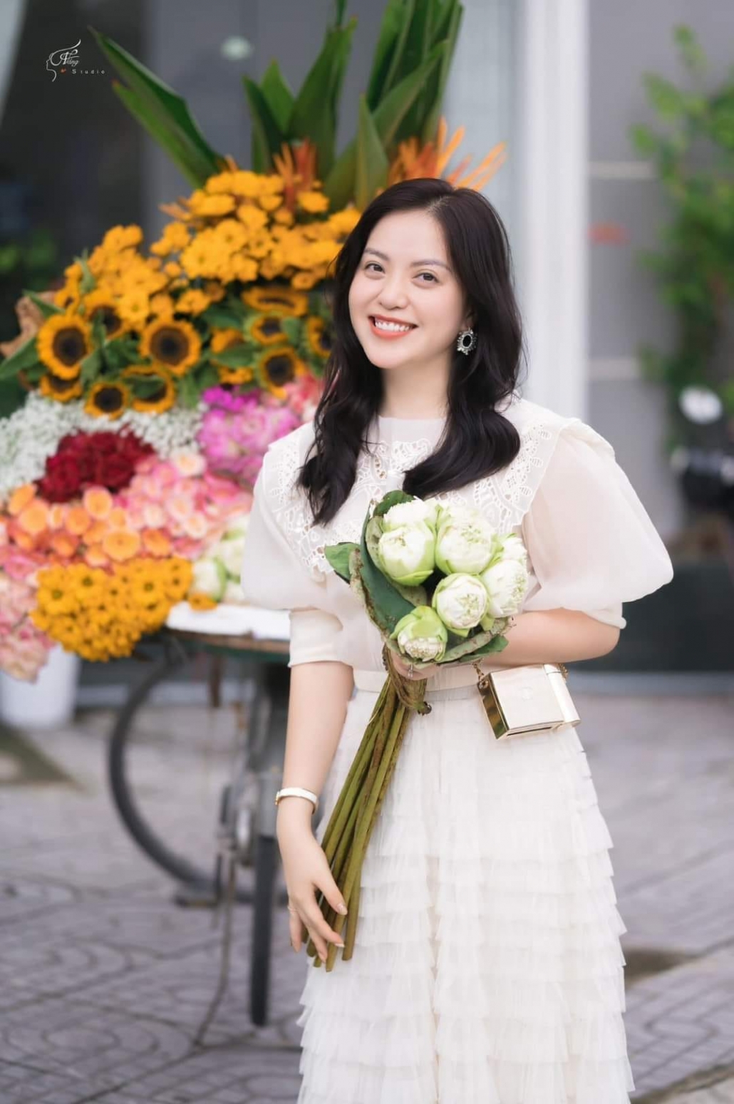 Young people in trend of check-in with flower bike on the streets