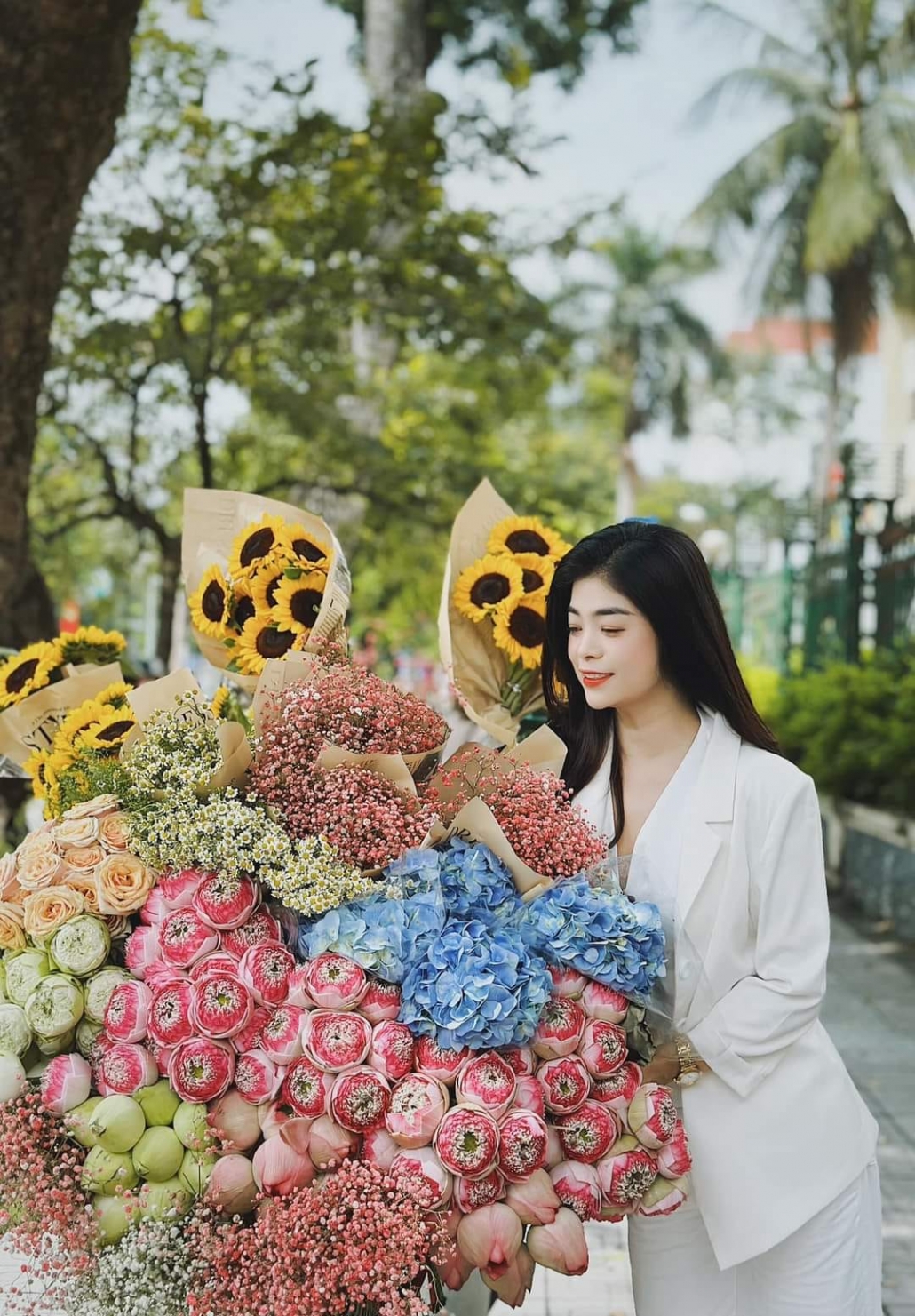 Young people in trend of check-in with flower bike on the streets