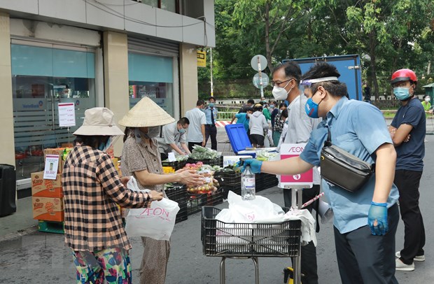 TP.HCM: Chung suc, dong long, quyet tam, nhat dinh se thang dich benh hinh anh 2