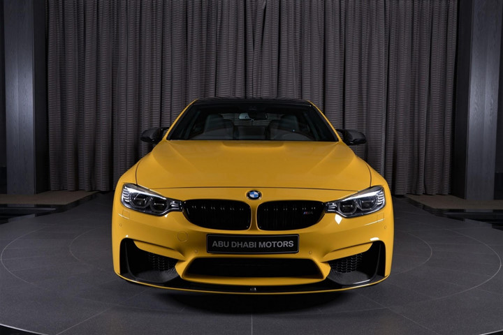 an tuong voi bmw m4 coupe speed yellow mau vang tuyet dep